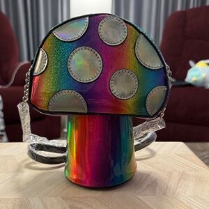 Novelty mushroom-shaped iridescent glitter crossbody handbag.